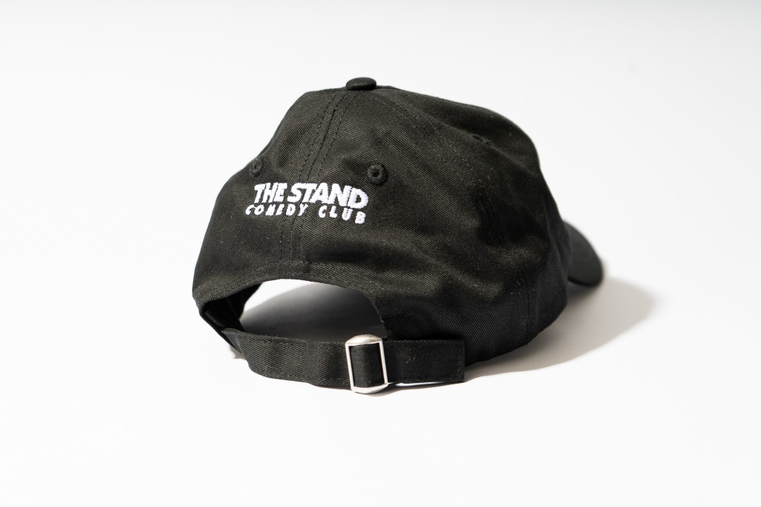 Back of the black Stand Comedy Club cap with logo embroidery
